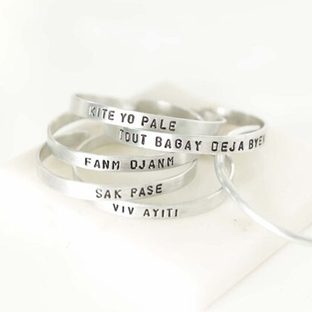 Aluminum Message Cuff: Kite Yo Pale - Kreyol Essence