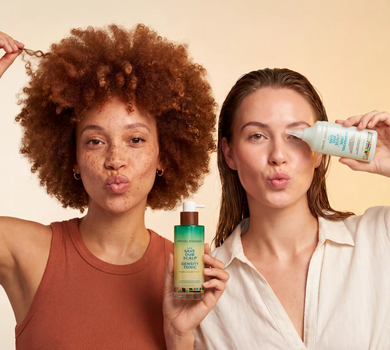 Two customers holding the Save Our Scalp density tonic