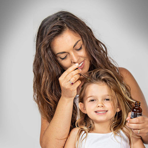 Haitian Black Castor Oil growth trio by Kreyòl Essence, featuring three bottles of natural Haitian castor oil for hair and scalp care.