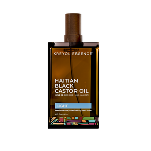 Kreyòl Essence Haitian Black Castor Oil Light bottle, 2oz, for daily skin and hair treatment, natural hair care product.
