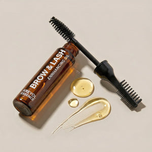 Kreyòl Essence Brow and Lash "Be Full" enhancing serum applicator with serum for fuller eyebrows and eyelashes.