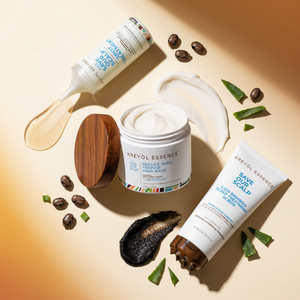 Kreyòl Essence Alopecia Essentials hair treatment kit with bottles and applicators for scalp care and hair growth.