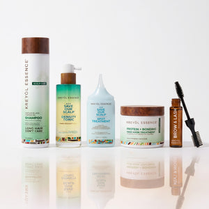 Kreyòl Essence GLP-1 Bundle gift set with natural skincare products, featuring multiple bottles and packaging in a colorful display.