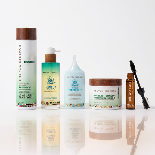 Kreyòl Essence GLP-1 Bundle gift set with natural skincare products, featuring multiple bottles and packaging in a colorful display.