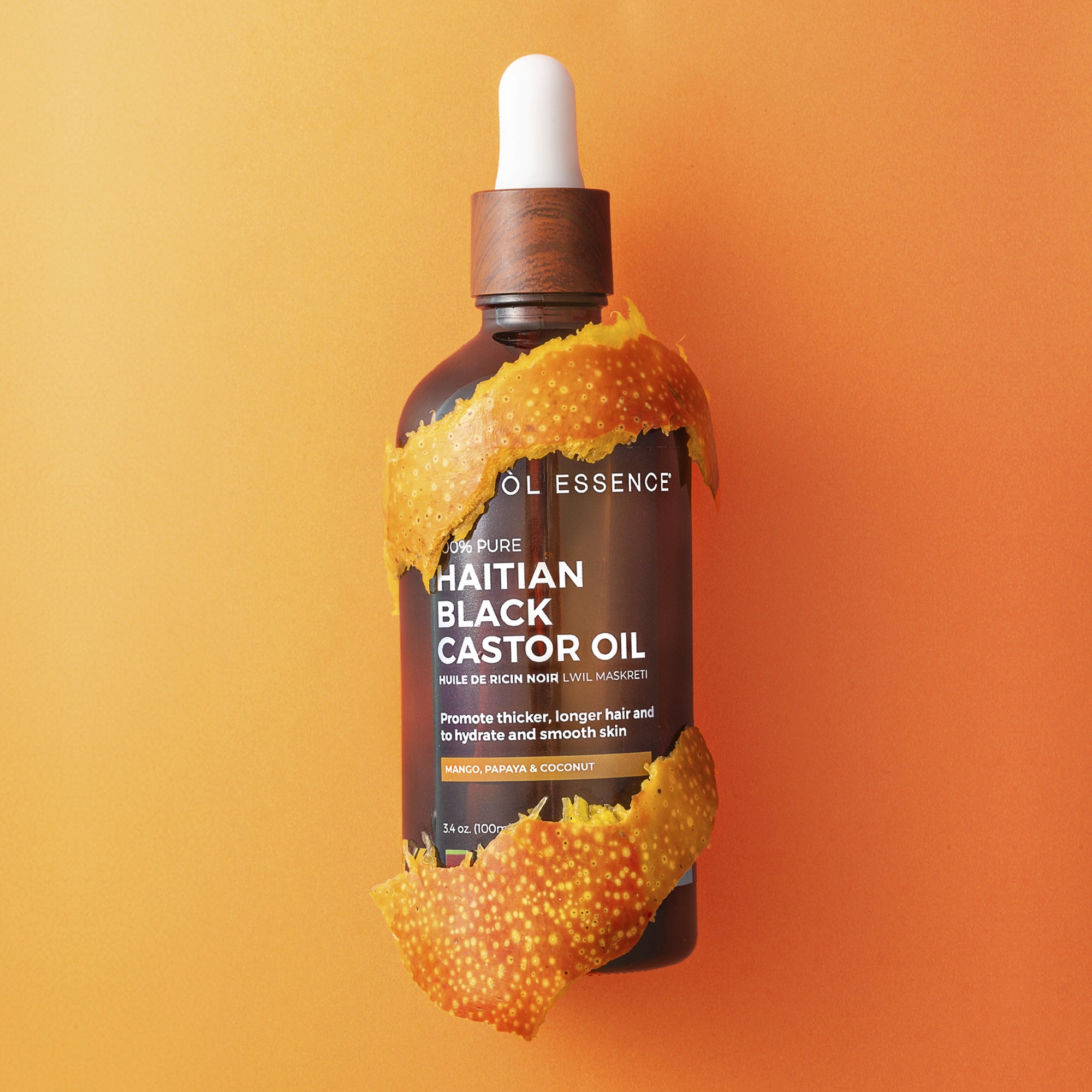 Buy Haitian Black Castor Oil: Mango Papaya & Coconut (3.4oz), get one FREE