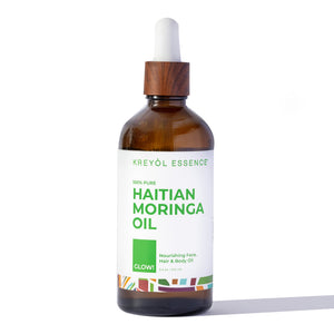Kreyòl Essence Haitian Moringa Oil bottle showing nourishing face and body skin care oil in 3.4oz size