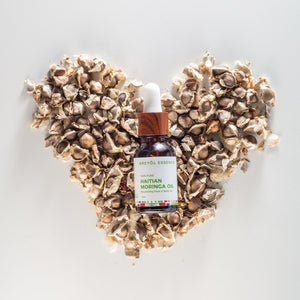 Haitian Moringa Oil by Kreyòl Essence in a 15ml bottle, nourishing face and body skin care oil with natural Moringa leaves.