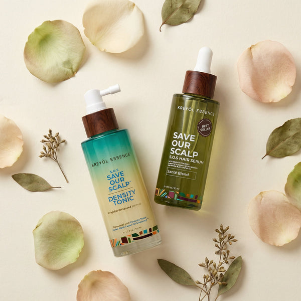 Kreyòl Essence SOS Stem Cell & Peptide Duo hair treatment bottle on a white background