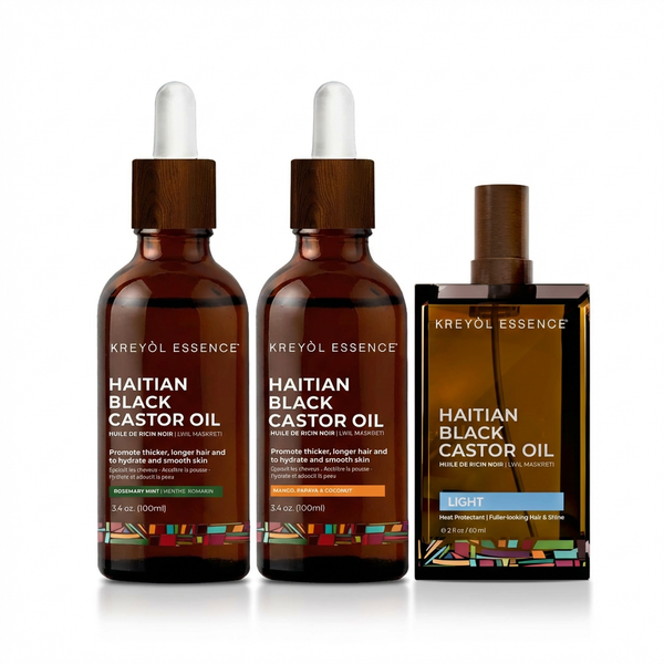 Kreyòl Essence Haitian Black Castor Oil Growth Trio bottles, showcasing the natural oil for hair and scalp nourishment.