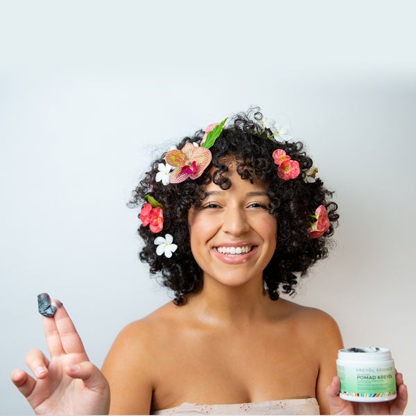 Kreyòl Essence Pomad Kreyòl natural scalp balm hair treatment jar with herbal ingredients, 4oz, for promoting hair growth and scalp health.