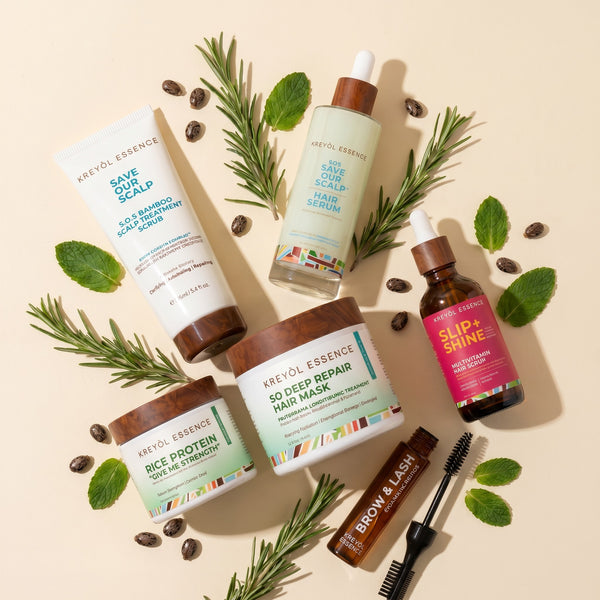 Kreyòl Essence Recovery Kit gift set with natural skincare products, including oils and creams for skin rejuvenation.