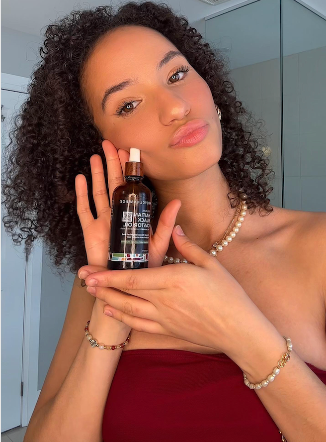 Kreyòl Essence Haitian Black Castor Oil with rosemary and peppermint, 2oz bottle for hair and scalp nourishment