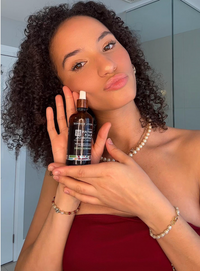 Kreyòl Essence Haitian Black Castor Oil with rosemary and peppermint, 2oz bottle for hair and scalp nourishment