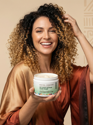 Kreyòl Essence Haitian Hair Cocktail Triple Threat Mask gift set with deep conditioner for curly and textured hair, white woman applying product