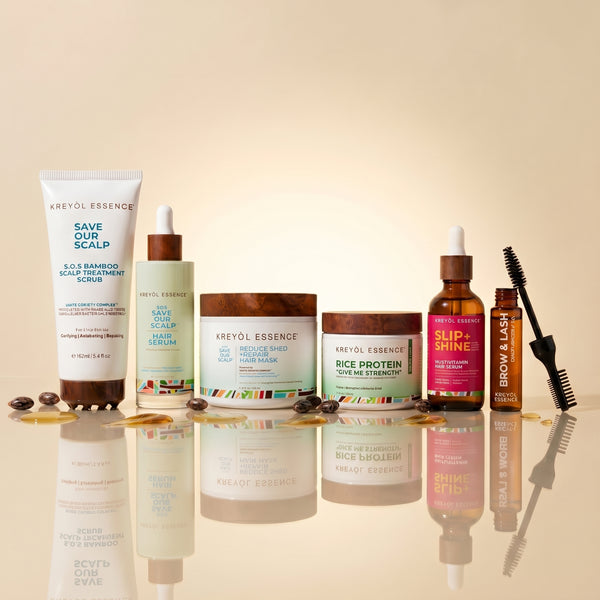 Kreyòl Essence recovery kit gift set with natural skincare products, including oils and lotions in eco-friendly packaging.