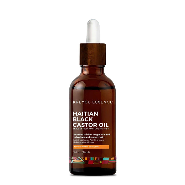 Haitian Black Castor Oil by Kreyòl Essence in 2oz bottle with mango, papaya, and coconut for hair and skin care.