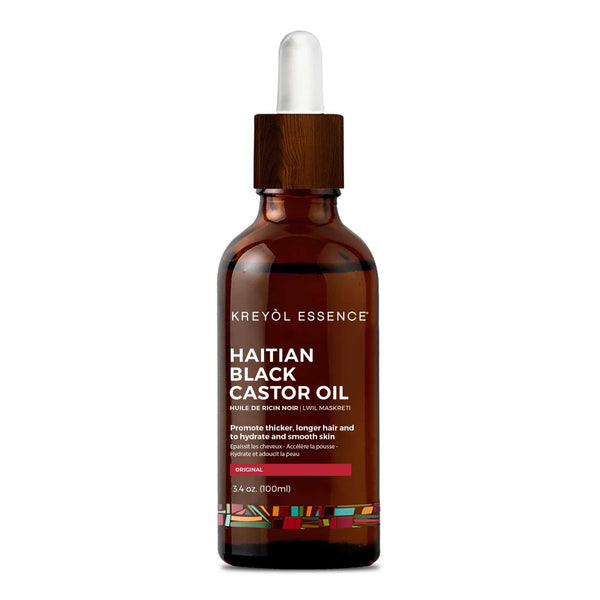 Haitian Black Castor Oil bottle by Kreyòl Essence, 3.4 oz, with dark castor oil inside and label displaying product details.