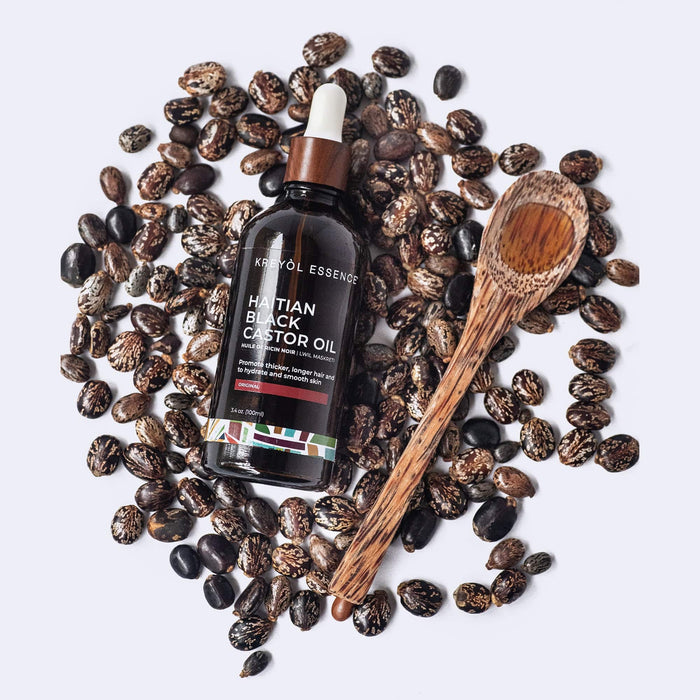 Haitian Black Castor Oil by Kreyòl Essence in a 3.4oz bottle, natural black castor oil for hair and skin care.