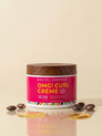 Kreyòl Essence OMG Curl Defining & Moisturizing Cream styling product for curls, 8oz jar with cream texture in a container.