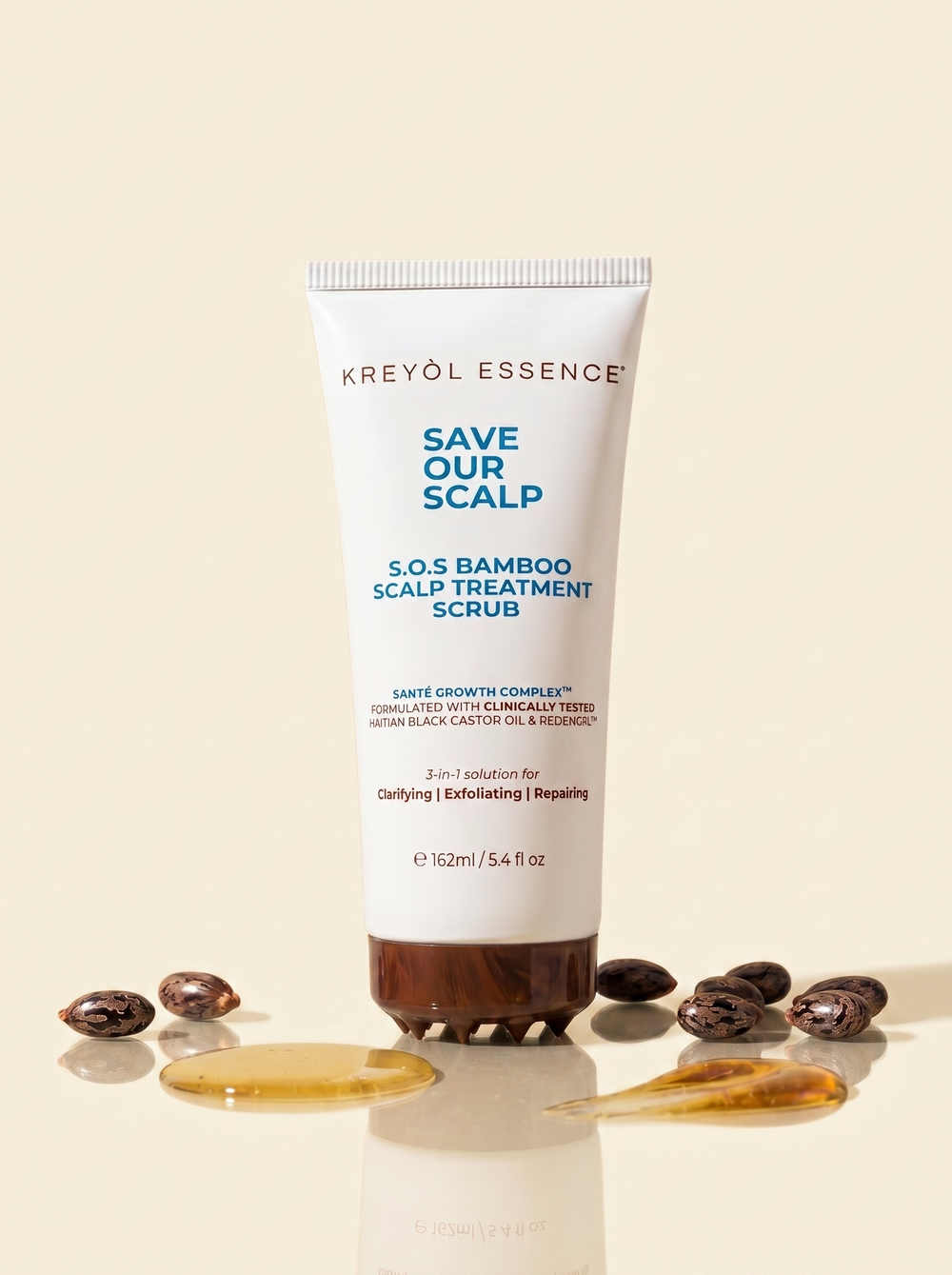 Kreyòl Essence Save Our Scalp Clarify Shampoo and Bamboo Scalp Scrub hair treatment bottles on a white background