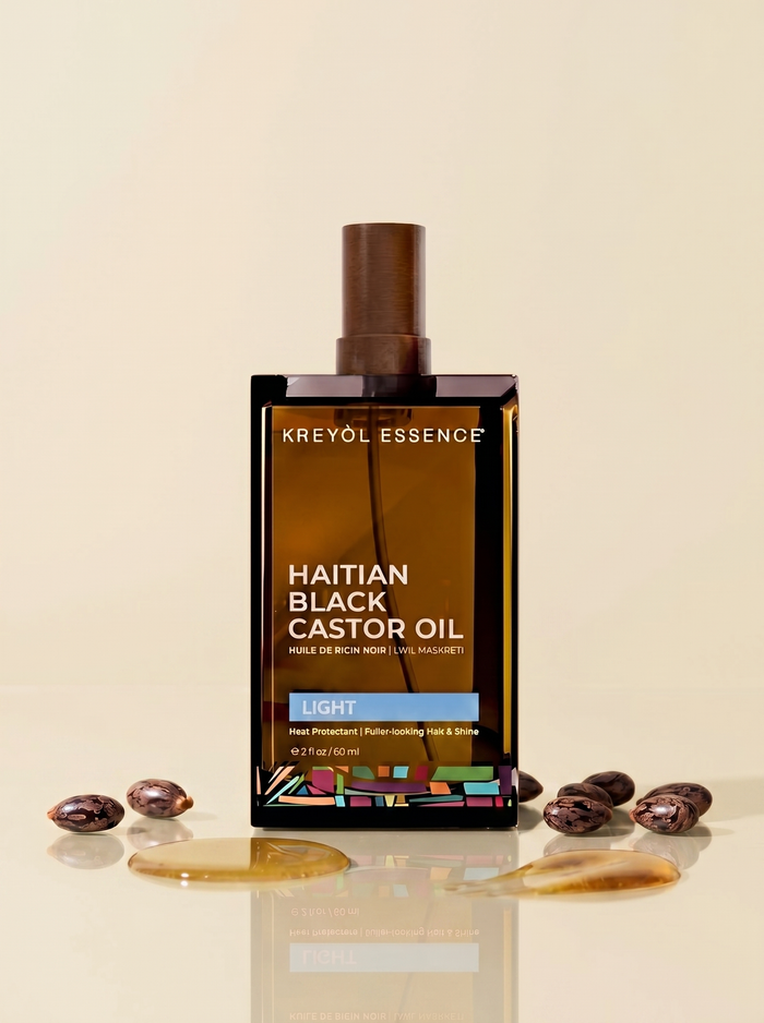 Kreyòl Essence Haitian Black Castor Oil Light for hair and skin, 2oz bottle, natural daily treatment for healthy hair and skin.