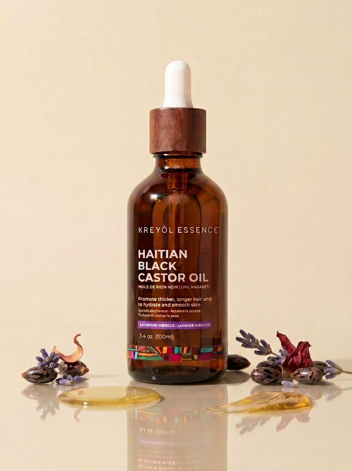 Haitian Black Castor Oil by Kreyòl Essence in 2oz bottle with lavender and hibiscus, natural hair and scalp treatment