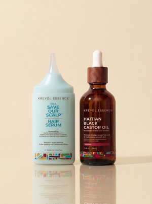 Kreyòl Essence Shark Tank Duo bundle featuring Haitian Black Castor Oil 2oz and S.O.S Serum Spot Treatment on a white background.