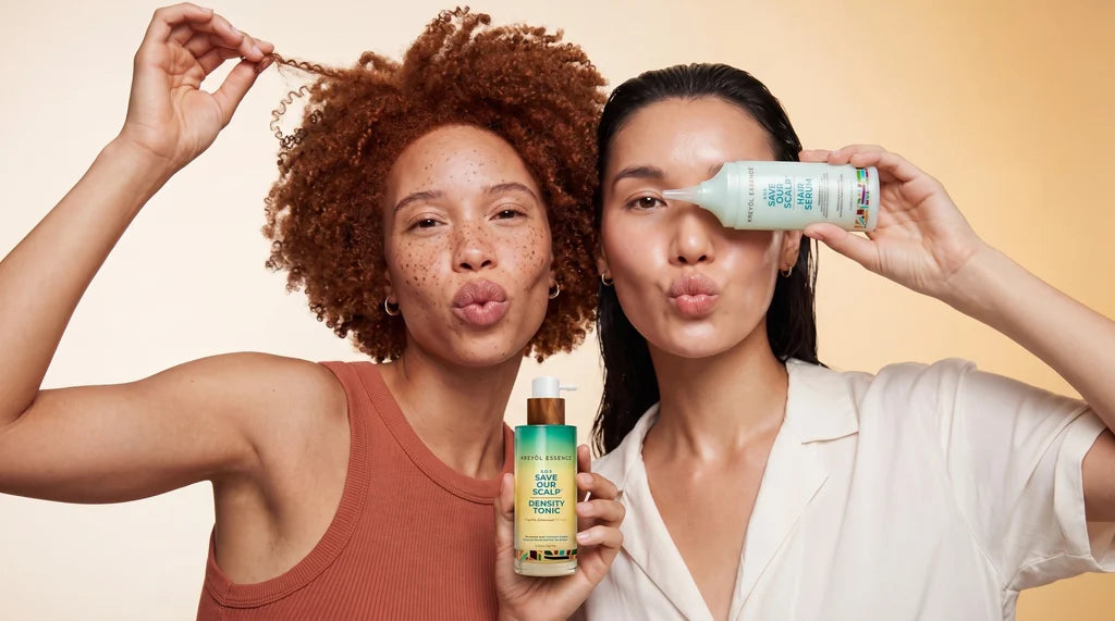 Two women holding S.O.S. Density Tonic and Hair Serum