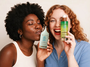 Kreyòl Essence F*** Shedding value and gift set with hair care products in a gift box, featuring natural ingredients and vibrant packaging.