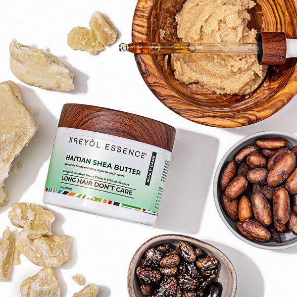 Kreyòl Essence rosemary mint pre-shampoo and moisture booster treatment mask in a 4oz jar with herbal ingredients.