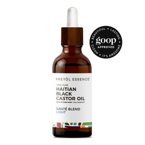 Kreyòl Essence Haitian Black Castor Oil in 3.4oz bottle, featuring Caribbean fresh aroma and clear black castor oil appearance.